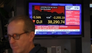 A trader works on the floor of the New York Stock Exchange April 4, 2025, in New York. (Photo by TIMOTHY A. CLARY / AFP)
