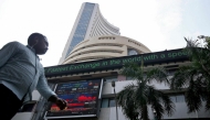 FILE PHOTO: A man walks past the Bombay Stock Exchange (BSE) building in Mumbai, India October 4, 2018. REUTERS/Francis Mascarenhas