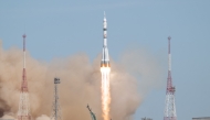 This handout photograph taken and released by NASA on April 8, 2025, shows the Soyuz MS-27 space craft blasting off the launch pad to head to the International Space Station (ISS) at the Russian-leased Baikonur cosmodrome in Kazakhstan. Photo by Joel KOWSKY / NASA / AFP.