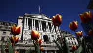 Tulips are pictured in front of the Bank of England, in central London, on April 7, 2025. Photo by BENJAMIN CREMEL / AFP.