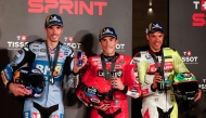 BK8 Gresini Racing MotoGP’s Spanish rider Alex Marquez (left) Ducati Lenovo’s Spanish rider Marc Marquez (centre) and Pertamina Enduro VR46 Racing Team’s Italian rider Franco Morbidelli pose for a picture following the Qatar Moto GP Grand Prix sprint race.