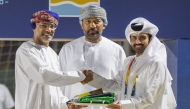Head of the Qatar Administrative Delegation at the Gulf Beach Games Abdullah Hassan Hashem receives the flag for 2026 Gulf Games.   