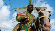 Participants parade during the Lagos Fanti Carnival, in Lagos on April 20, 2025. (Photo by Toyin Adedokun / AFP)