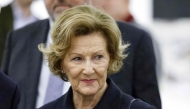 Queen Sonja of Norway reacts as she visits the 