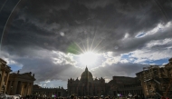 This photograph shows a view of St Peter's Basilica of The Vatican where the late Pope lies in state, taken from Rome on April 24, 2025.  (Photo by Alberto Pizzoli / AFP)