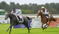 Jean-Bernard Eyquem (left) guides Intisar De Monlau to Prix Nefta - Wathba Stud Farm victory.