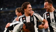 Juventus' Turkish forward #10 Kenan Yildiz (centre) celebrates scoring his team's first goal during the UEFA Champions League 1st round day 1 football match between Juventus FC and PSV Eindhoven, at the Juventus Stadium in Turin on September 17, 2024. (Photo by Isabella Bonotto / AFP)

