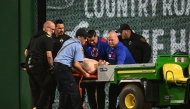 A fan is carted off the field after falling from the stands during the seventh inning of the game between the Chicago Cubs and the Pittsburgh Pirates at PNC Park on April 30, 2025 in Pittsburgh, Pennsylvania. Joe Sargent/Getty Images/AFP