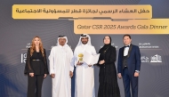 Officials pose for a group photo during the awards ceremony held at the conclusion of the ‘Qatar CSR Summit 2025 on April 30, 2025.