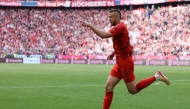 Bayern Munich's English defender #15 Eric Dier celebrates scoring his team's third goal during the German first division Bundesliga football match between FC Bayern Munich and 1 FSV Mainz 05 in Munich, southern Germany on April 26, 2025. (Photo by Alexandra BEIER / AFP)