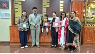 BPS student Dhvani Tejaswi with school staff and teachers.