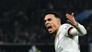 Liverpool's English defender #66 Trent Alexander-Arnold celebrates after scoring his team second goal during the English Premier League football match between Aston Villa and Liverpool at Villa Park in Birmingham, central England on February 19, 2025. Photo by Paul ELLIS / AFP