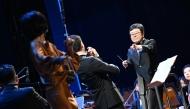 Conductor Jin Ye from Beijing Symphony Orchestra conducts during a concert of the 5th Taihu Jazz Festival in Tongzhou District of Beijing, capital of China, April 30, 2025. The 5th Taihu Jazz Festival opened in Tongzhou District of Beijing on Wednesday. (Xinhua/Chen Zhonghao)
