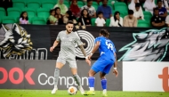 Al Sadd's Giovani (left) in action against Al Kharaitiyat's Axel Paul Urie yesterday. 