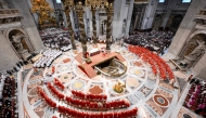 This photo taken and handout on May 7, 2025 by The Vatican Media shows cardinals during a holy mass for the Election of the Roman Pontiff, prior to the start of the conclave, at St Peter's Basilica in The Vatican. (Photo by Handout / VATICAN MEDIA / AFP) 