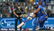 Mumbai Indians' Rohit Sharma plays a shot during the Indian Premier League (IPL) Twenty20 cricket match between Mumbai Indians and Gujarat Titans at the Wankhede Stadium in Mumbai on May 6, 2025. (Photo by INDRANIL MUKHERJEE / AFP)