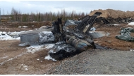 This handout photo taken and released on May 7, 2025 by the Finnish Air Force shows a destroyed F/A-18 Hornet fighter jet after its crash near the Rovaniemi Airport in Rovaniemi, Finnish Lapland. Photo by Handout / FINNISH AIR FORCE / AFP