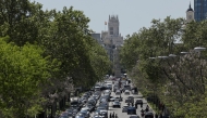 A Police car officers (C) is parked under switched-off traffic lights during a massive power cut affecting the entire Iberian peninsula and the south of France, in Madrid on April 28, 2025. Photo by OSCAR DEL POZO / AFP