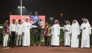 The connections of Alebb Katara celebrate their win. PIC: Juhaim/QREC
