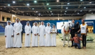 The connections of Talal Al Waab pose for a group photo after their win. PIC: Juhaim/QREC