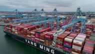 A container ship docked at the Port of Long Beach in California. (Photo by Eric Thayer/Bloomberg)