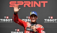 Ducati Lenovo Team's Spanish MotoGP rider Marc Marquez poses after winning the sprint race, as part of the France Moto GP Grand Prix, at Le Mans Circuit on May 10, 2025. (Photo by LOIC VENANCE / AFP)
