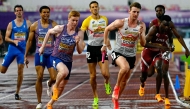From left: Britain's Rio Mitcham with compatriot Charles Dobson, Belgium’s Dylan Borlee with compatriot Alexander Doom and Qatar’s Ammar Ismail Yahia Ibrahim with compatriot Ashraf Hussen Osman compete in the race. AFP