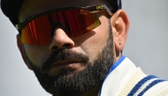 (Files) India's Virat Kohli reacts ahead of play on day 2 of the ICC World Test Championship cricket final match between Australia and India at The Oval, in London, on June 8, 2023. (Photo by Glyn Kirk / AFP) 
