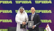 Qatar Basketball Federation President and the FIBA Basketball World Cup – Qatar 2027 LOC Director General, Mohammed Al-Meghaiseeb (left) and FIBA Secretary General Andreas Zagklis during agreement signing ceremony.