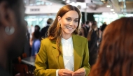 Britain's Catherine, Princess of Wales smiles during a visit to present 