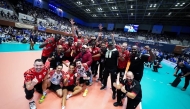 Al Rayyan players celebrate after winning the title.