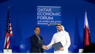 Officials during the signing ceremony at Qatar Economic Forum.