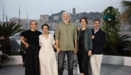 (From L) Australian human rights lawyer and barrister Jennifer Robinson, Swedish-Spanish lawyer Stella Assange, Australian publisher, activist Julian Assange, British-French producer Kathleen Fournier and US filmmaker Eugene Jarecki pose during a photocall for the film 