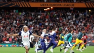 Tottenham Hotspur players including Brazilian forward #09 Richarlison celebrate after the UEFA Europa League final football match between Tottenham Hotspur and Manchester United at the San Mames stadium in Bilbao on May 21, 2025. (Photo by Pierre-Philippe MARCOU / AFP)
