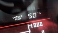 A dashboard display shows an external temperatue of 50 degrees celsius outside a vehicle in Dubai on May 23, 2025. (Photo by Giuseppe CACACE / AFP)