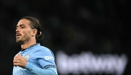 Manchester City's English midfielder #10 Jack Grealish enters the pitch during the English Premier League football match between Manchester City and Bournemouth at the Etihad Stadium in Manchester, north west England, on May 20, 2025. (Photo by Paul ELLIS / AFP)