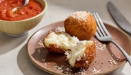 Arancini (Fried Rice Balls With Cheese). Photo by Tom McCorkle; food styling by Gina Nistico/Both for The Washington Post