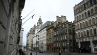 Pedestrians walk down Water Street in Liverpool, north-west England on May 28, 2025, where a car ploughed in to crowds that had gathered on May 26. (Photo by Paul Ellis / AFP)