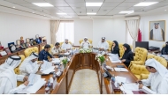 MoJ Undersecretary H E Saeed bin Abdullah Al Suwaidi and other officials during the meeting.