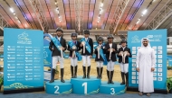 Top six riders of the Intro 80cm class celebrate their success, led by Alya Hamad Jassim Al Thani, followed by Melina Karagiannidi and Adel Abdel Raziq. Salman Faisal Al Marri, Maryam Ahmed Mohamood Erbad, and Jassim Saoud Al Fakhroo complete the top six in the event at Al Shaqab yesterday.