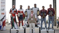 Qatar's Nasser Saleh Al Attiyah with his co-driver Candido Carrera celebrates on the podium after winning the Jordan Rally.  Abdullah Al Rawahi of Oman and Ata Al Hmoud of Jordan came second while Qatar's Abdulaziz Al Kuwari  and Irish co-driver Lorcan Moore secured third place. 