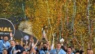 Pyramids' players celebrate winning the CAF Champions League final football match between Pyramids FC and Mamelodi Sundowns at 30 June Stadium in Cairo on June 1, 2025. (Photo by Khaled DESOUKI / AFP)
