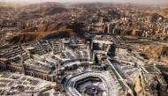 This picture shows a view of Islam's holy city of Mecca with Muslim worshippers at the Grand Mosque complex ahead of the annual Hajj pilgrimage on June 1, 2025. Photo by HAZEM BADER / AFP.
