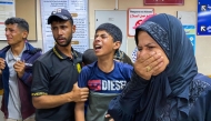 Palestinians react as they await news of a relative who was injured in Israeli strikes in Khan Yunis, at the Nasser hospital in the southern Gaza Strip on June 3, 2025. (Photo by AFP)