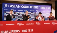 China's Croatian head coach Branko Ivankovic (2nd L) and China's Zhang Yuning (R) attend a press conference ahead of the FIFA World Cup 2026 Asia zone qualifiers group C football match between Indonesia and China at Gelora Bung Karno Stadium in Jakarta on June 4, 2025. (Photo by YASUYOSHI CHIBA / AFP)