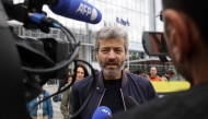 Jean-François Julliard, director general of Greenpeace France, talks to the press on the sidelines a rally to show support for two Greenpeace members facing a judge for their arraignment at the Paris courthouse, on June 5, 2025. (Photo by Geoffroy Van Der Hasselt / AFP)
