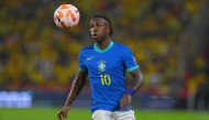 Brazil's forward #10 Vinicius Jr eyes the ball during the 2026 FIFA World Cup South American qualifiers football match between Ecuador and Brazil at the Monumental Banco Pichincha stadium in Guayaquil, province of Guayas, Ecuador on June 5, 2025. (Photo by Rodrigo BUENDIA / AFP)
