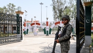 Photo used for representational purposes. A Pakistan Ranger stands guard at the Kartarpur Sahib Corridor complex, which runs along the India-Pakistan border in Kartarpur, on May 22, 2025. Photo by Arif ALI / AFP.