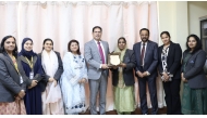 Officials from Pearl School, Al Dafna with the award.