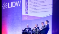 QICDRC delegates participating in a session of the event.